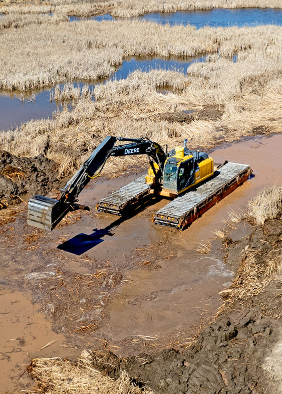Our amphibious excavators are a type of excavator designed to operate on both land and water. It is equipped with special pontoons or floats that allow it to float on water while performing excavation work, such as dredging, shoreline restoration, and wetland construction. Amphibious excavators are commonly used in aquatic environments, such as lakes, rivers, and coastal areas, where traditional land-based excavators cannot operate. They are also used in areas where the water level fluctuates, as they can easily transition between land and water without the need for additional equipment or transport. Amphibious excavators are versatile machines that provide a cost-effective and efficient solution for a variety of excavation and construction projects.